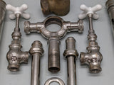 c1900 Tub Tower Drain with faucets, shutoff valves, elephant-trunk style spout
