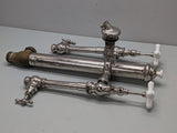 c1900 Tub Tower Drain with faucets, shutoff valves, elephant-trunk style spout