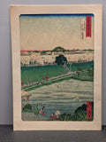1871 Japanese print by Shosai Ikkei "Mimeguri Shrine with Distant View of Matsuchiyama Hill"