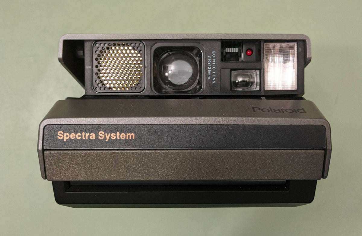 Polaroid Spectra System Instant Film Camera w/Quintic Lens F*S – Reticulum