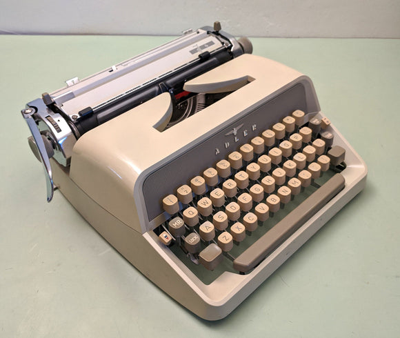 Adler J2 - J4 Manual Portable Typewriter owner's and user's manual PDF format